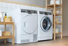 Two-white-duet-dryers-inside-a-laundry-room