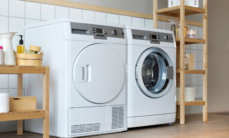 Two-white-duet-dryers-inside-a-laundry-room